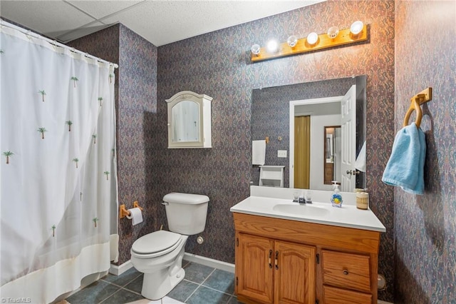 full bath featuring toilet, vanity, tile patterned flooring, baseboards, and wallpapered walls