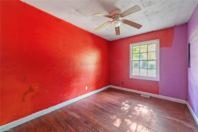 1278 Tredwell Dr, Winston-Salem, NC 27103 - spare room featuring wood finished floors, ceiling fan, and a textured ceiling