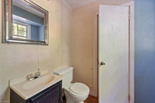 1278 Tredwell Dr, Winston-Salem, NC 27103 - half bathroom featuring vanity and toilet
