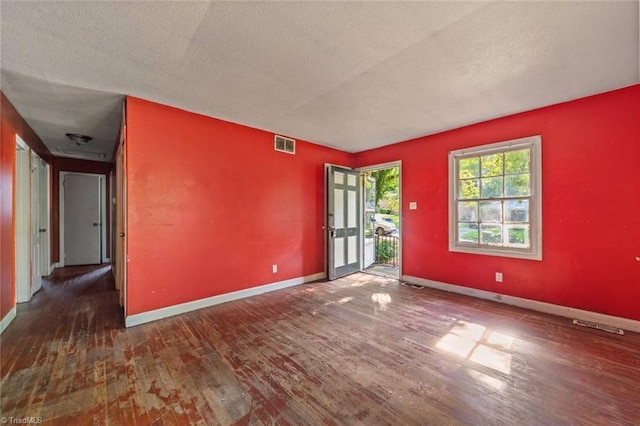1278 Tredwell Dr, Winston-Salem, NC 27103 - empty room featuring wood finished floors and a textured ceiling