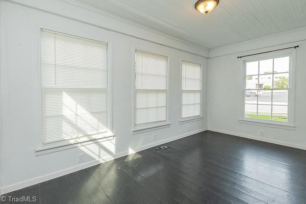112 S Caldwell St, Salisbury, NC 28144 - empty room featuring baseboards, dark wood-style floors, and ornamental molding