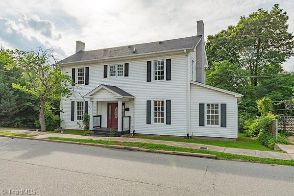 112 S Caldwell St, Salisbury, NC 28144 - colonial house featuring a chimney