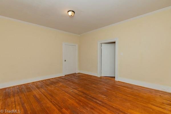 112 S Caldwell St, Salisbury, NC 28144 - empty room with hardwood / wood-style floors, ornamental molding, and baseboards