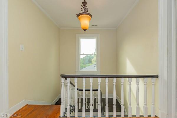 112 S Caldwell St, Salisbury, NC 28144 - stairs featuring ornamental molding and baseboards