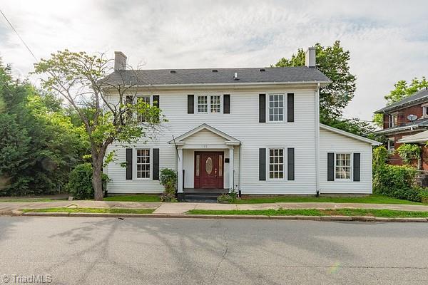 112 S Caldwell St, Salisbury, NC 28144 - colonial home with a chimney