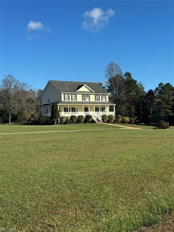 view of front of property with a front lawn