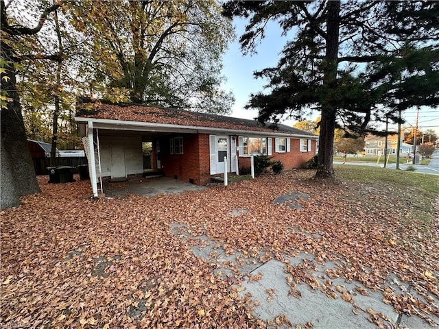 view of front of house featuring a carport