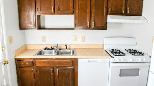 kitchen with white appliances and sink