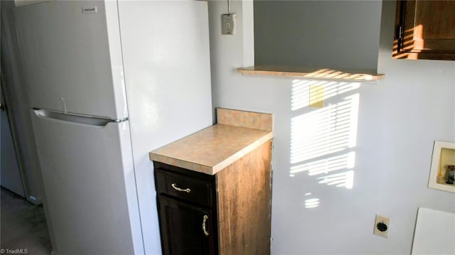 interior space featuring white refrigerator