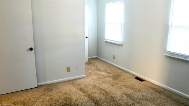 view of carpeted spare room