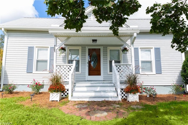 bungalow-style house featuring covered porch