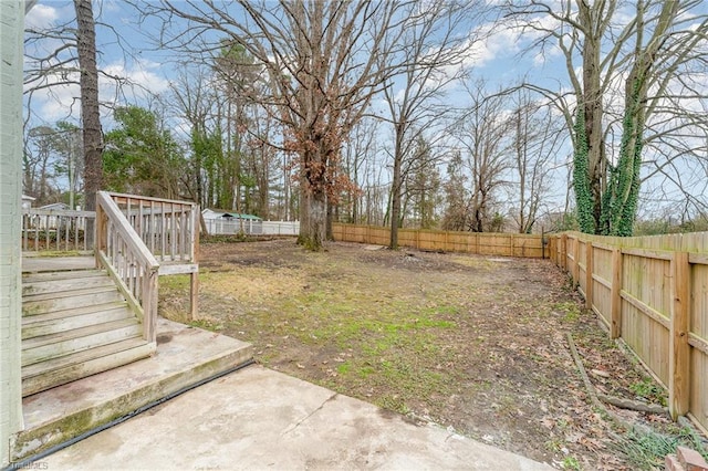 view of yard with a wooden deck