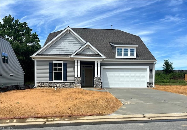 740 Brooklet Ct, Winston-Salem, NC 27127 - craftsman inspired home featuring driveway, a garage, stone siding, and roof with shingles