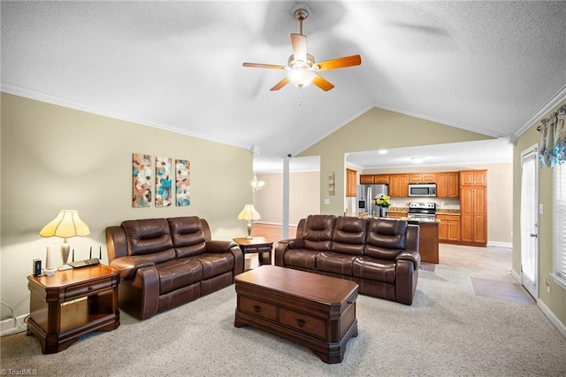 269 Country Villa Dr, Lexington, NC 27295 - living area with ceiling fan, lofted ceiling, light colored carpet, crown molding, and baseboards