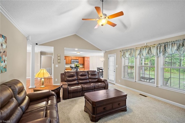 269 Country Villa Dr, Lexington, NC 27295 - living room featuring lofted ceiling, a ceiling fan, crown molding, decorative columns, and baseboards