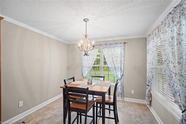 269 Country Villa Dr, Lexington, NC 27295 - dining room with a textured ceiling, ornamental molding, a chandelier, and baseboards