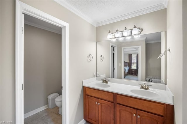 269 Country Villa Dr, Lexington, NC 27295 - ensuite bathroom featuring double vanity, toilet, ornamental molding, tile patterned flooring, and baseboards