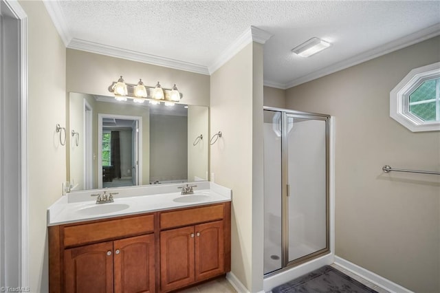 269 Country Villa Dr, Lexington, NC 27295 - bathroom with a stall shower, double vanity, baseboards, ornamental molding, and a textured ceiling