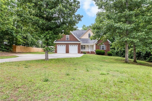 269 Country Villa Dr, Lexington, NC 27295 - view of front of property featuring driveway, brick siding, and a garage