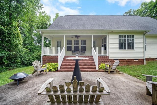 269 Country Villa Dr, Lexington, NC 27295 - view of front of house with an outdoor fire pit, a ceiling fan, crawl space, stairs, and a shingled roof