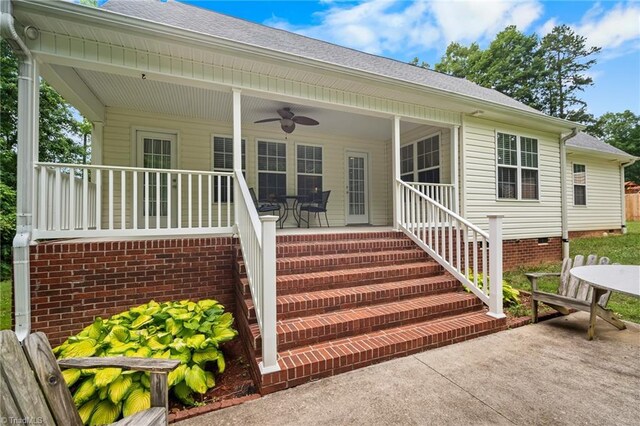 269 Country Villa Dr, Lexington, NC 27295 - property entrance featuring ceiling fan, covered porch, and roof with shingles