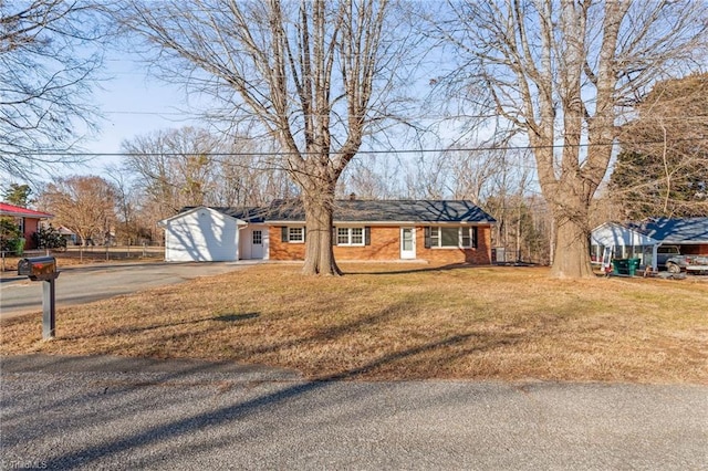 ranch-style house with a front yard