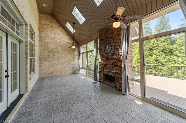 2507 Duck Club Rd, Greensboro, NC 27410 - unfurnished sunroom featuring a skylight, vaulted ceiling, and french doors