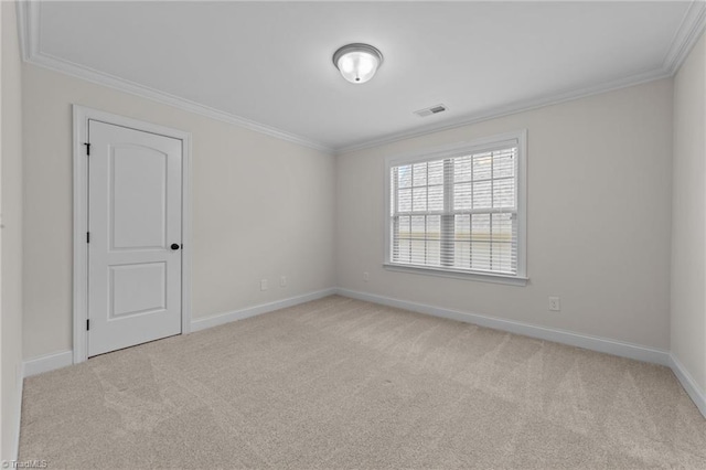 2507 Duck Club Rd, Greensboro, NC 27410 - spare room featuring ornamental molding and light colored carpet