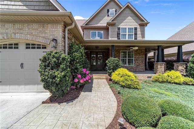 2507 Duck Club Rd, Greensboro, NC 27410 - view of front of property with french doors, covered porch, and a garage