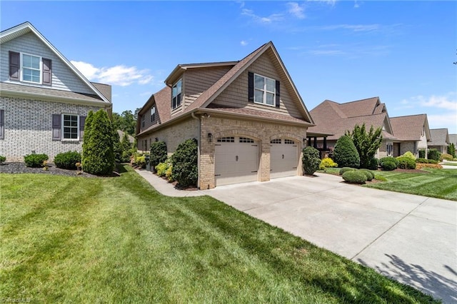 2507 Duck Club Rd, Greensboro, NC 27410 - view of front facade with an attached garage, brick siding, driveway, and a front yard