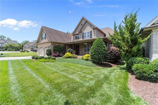 2507 Duck Club Rd, Greensboro, NC 27410 - view of home's exterior featuring a lawn, brick siding, and an attached garage