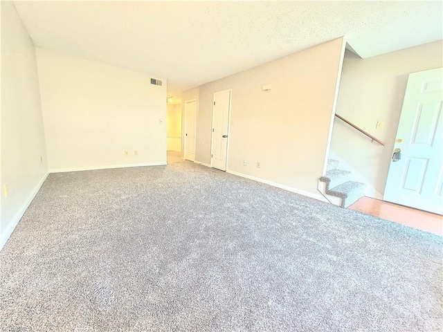 1018 Cedar Place Ct, Winston-Salem, NC 27107 - unfurnished room featuring carpet flooring, stairway, and baseboards