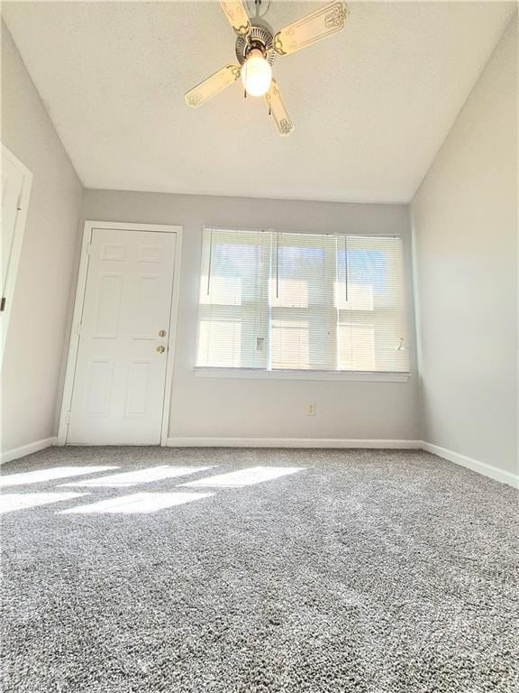 1018 Cedar Place Ct, Winston-Salem, NC 27107 - carpeted empty room with plenty of natural light, baseboards, a ceiling fan, and vaulted ceiling