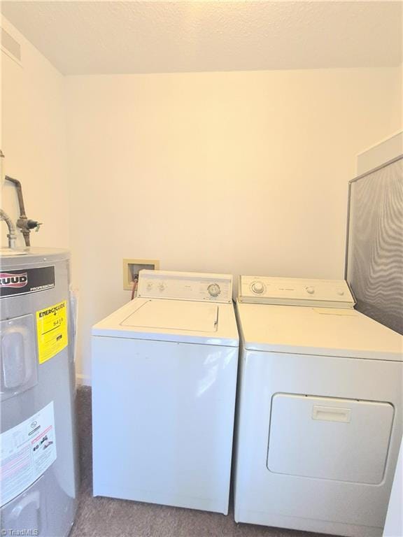 1018 Cedar Place Ct, Winston-Salem, NC 27107 - laundry room featuring water heater, washing machine and clothes dryer, and carpet floors