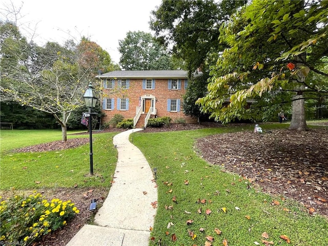 view of front of home with a front yard