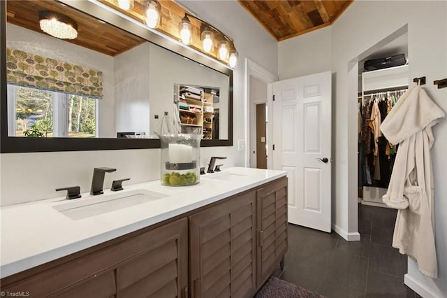 bathroom featuring vanity and wood ceiling