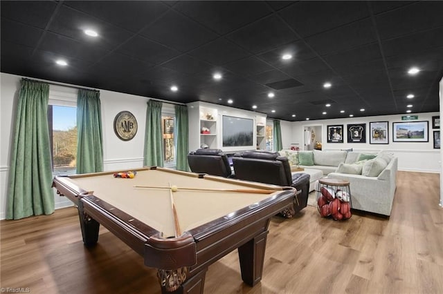 playroom with light hardwood / wood-style floors and pool table