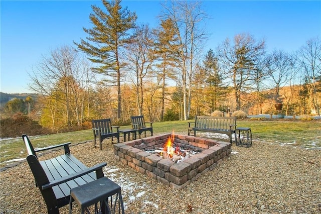 exterior space with an outdoor fire pit