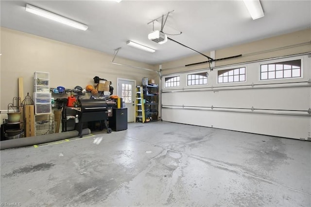 garage featuring a garage door opener