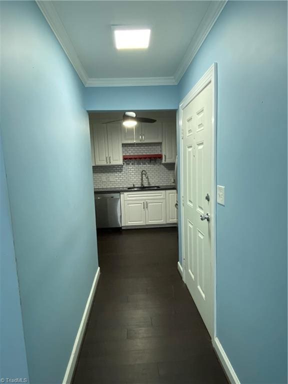 2821 Bleeker Sq Unit E, Winston-Salem, NC 27106 - hallway featuring a sink, crown molding, dark wood finished floors, and baseboards