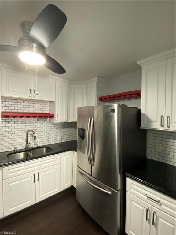2821 Bleeker Sq Unit E, Winston-Salem, NC 27106 - kitchen with a sink, stainless steel refrigerator with ice dispenser, dark countertops, and white cabinetry