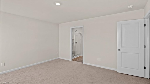 3765 Baden Rd, Winston-Salem, NC 27107 - unfurnished bedroom featuring carpet floors, connected bathroom, baseboards, and recessed lighting