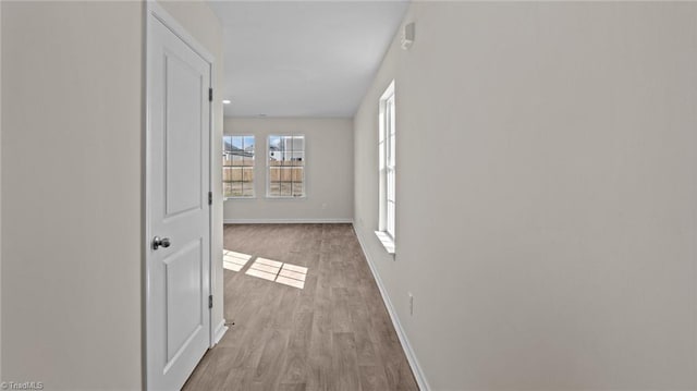 3765 Baden Rd, Winston-Salem, NC 27107 - hallway featuring baseboards and wood finished floors