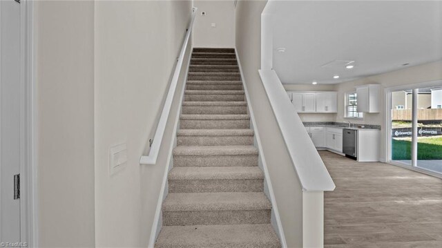 3765 Baden Rd, Winston-Salem, NC 27107 - staircase with baseboards, recessed lighting, and wood finished floors