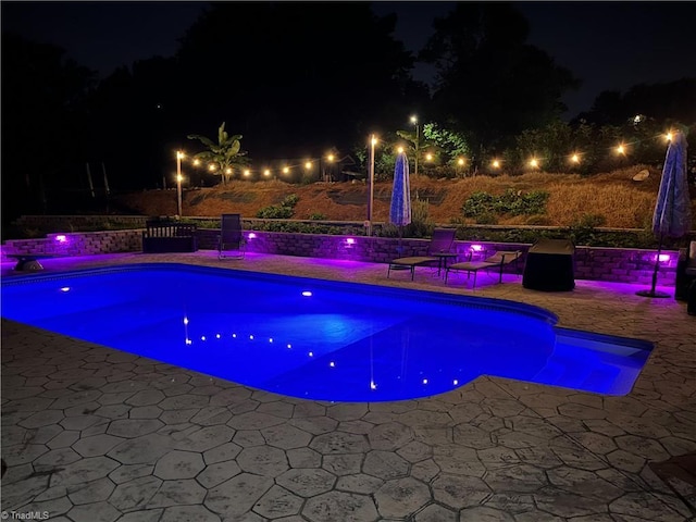 422 Manor Dr, High Point, NC 27260 - pool at twilight featuring a patio