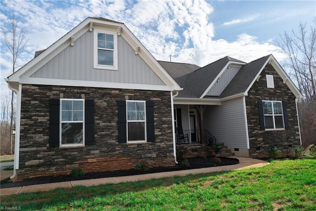 craftsman inspired home with a front yard