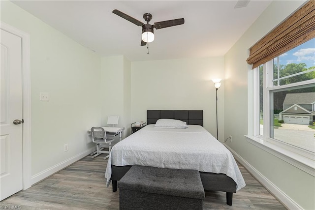 2452 Tannin Ct, High Point, NC 27265 - bedroom with light wood-style flooring and ceiling fan