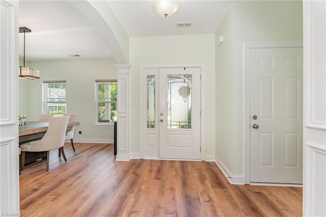 2452 Tannin Ct, High Point, NC 27265 - entryway with arched walkways and light wood-style floors