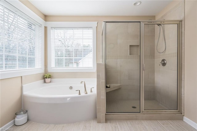 bathroom with a wealth of natural light and plus walk in shower