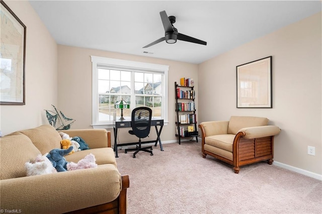 office area with ceiling fan and light colored carpet